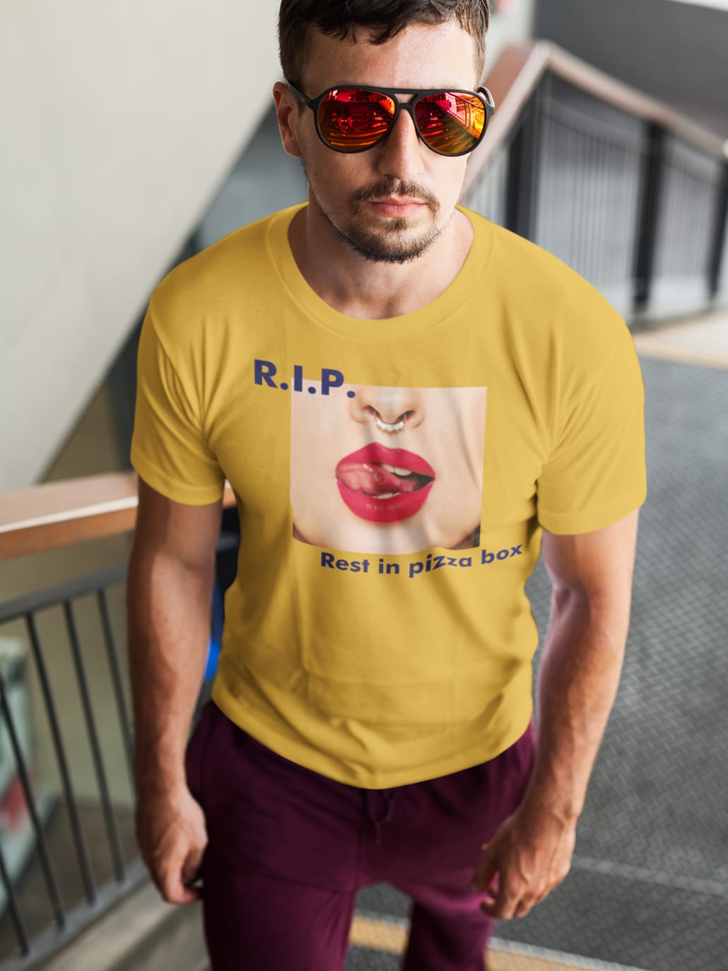 young man with yellow t-shirt and sunglasses